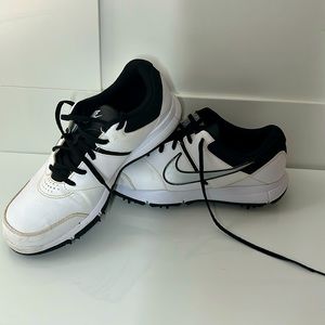 White Nike golf shoes with spikes
